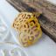 Bild von Ornament-Ohrstecker goldf. - Rhombusform - golden brown
